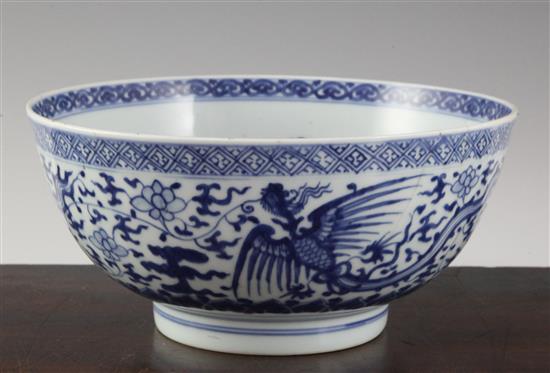 A Chinese blue and white phoenix bowl , Kangxi/Yongzheng period, 21.5cm, cracks